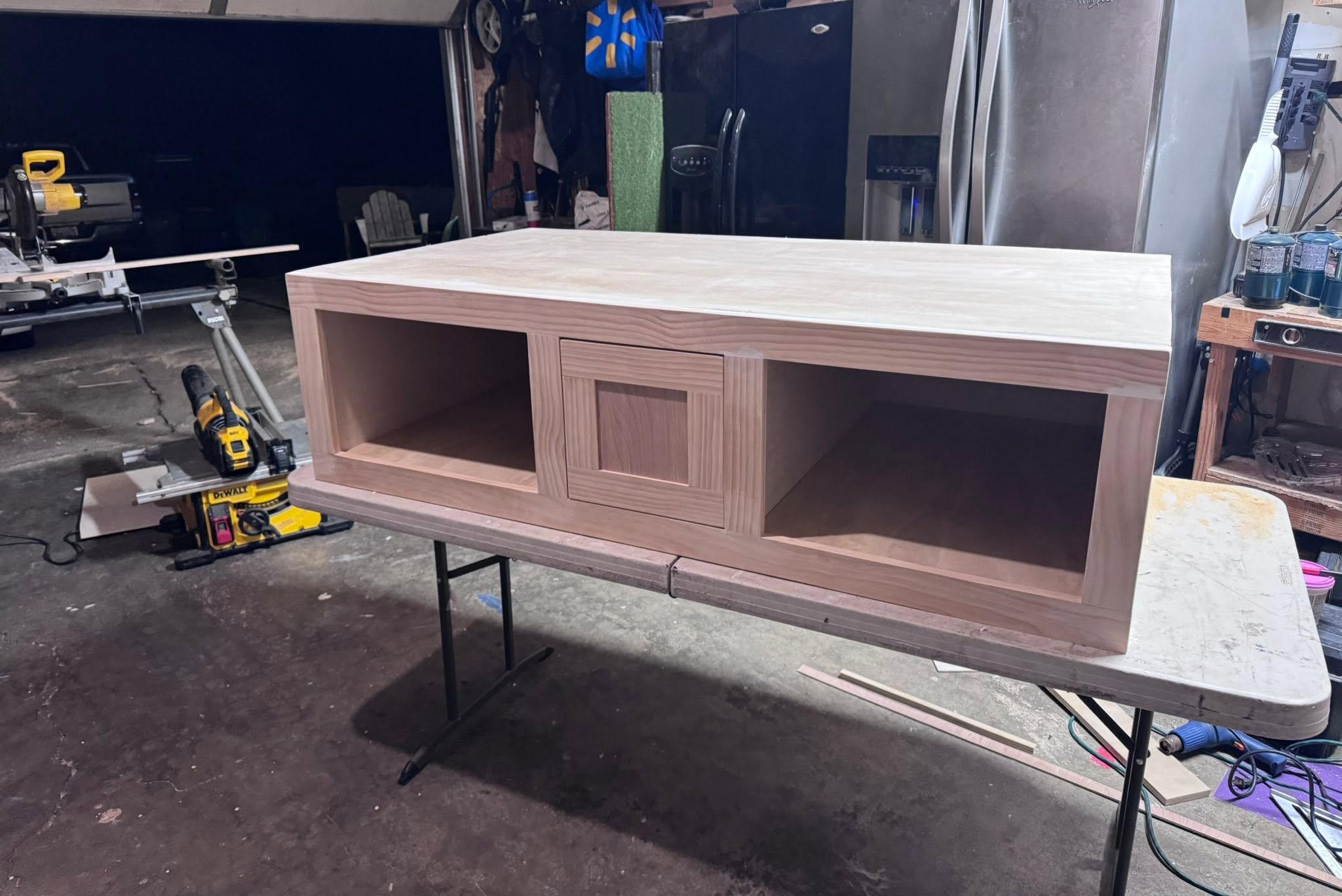 Hand-built wood console with a shaker drawer and open cubbies